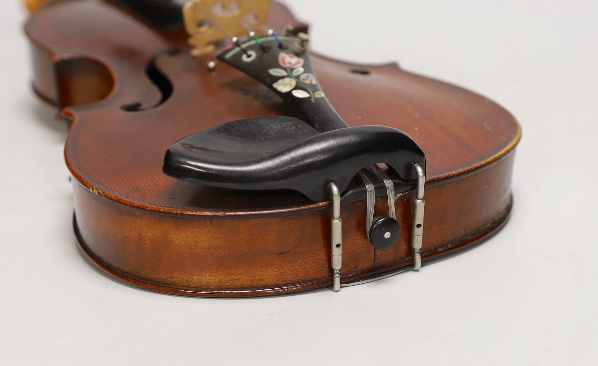 A French single back violin, interior label reads ‘Médio Fino’, back measures 35.5cm excl button. With case and bow